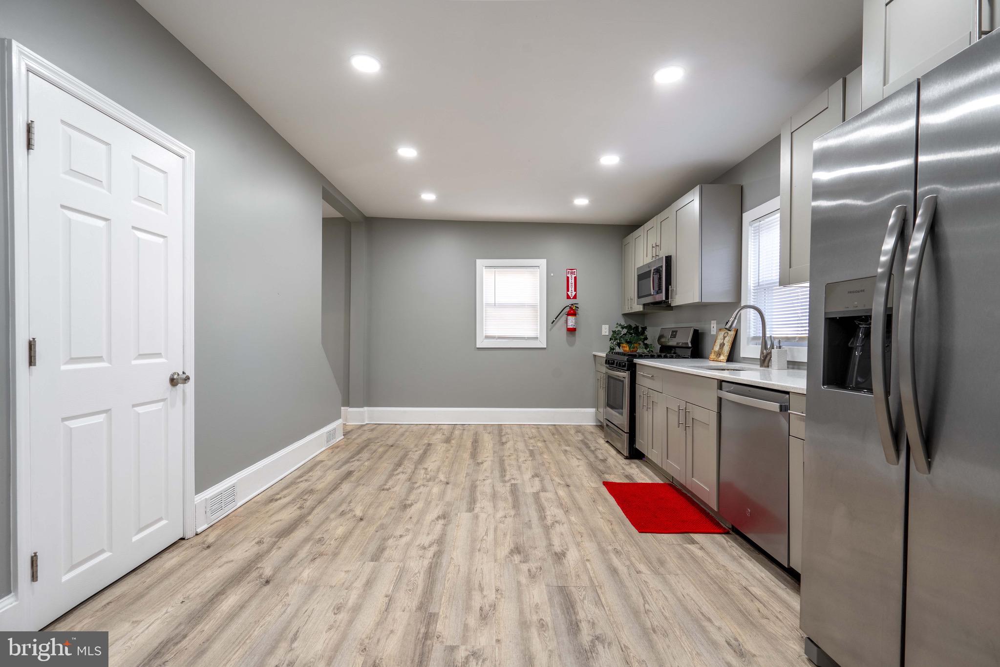 2172 Atco Avenue Atco, NJ 08004 - Photo 14 of 35 a kitchen with granite countertop stainless steel appliances refrigerator sink and cabinets