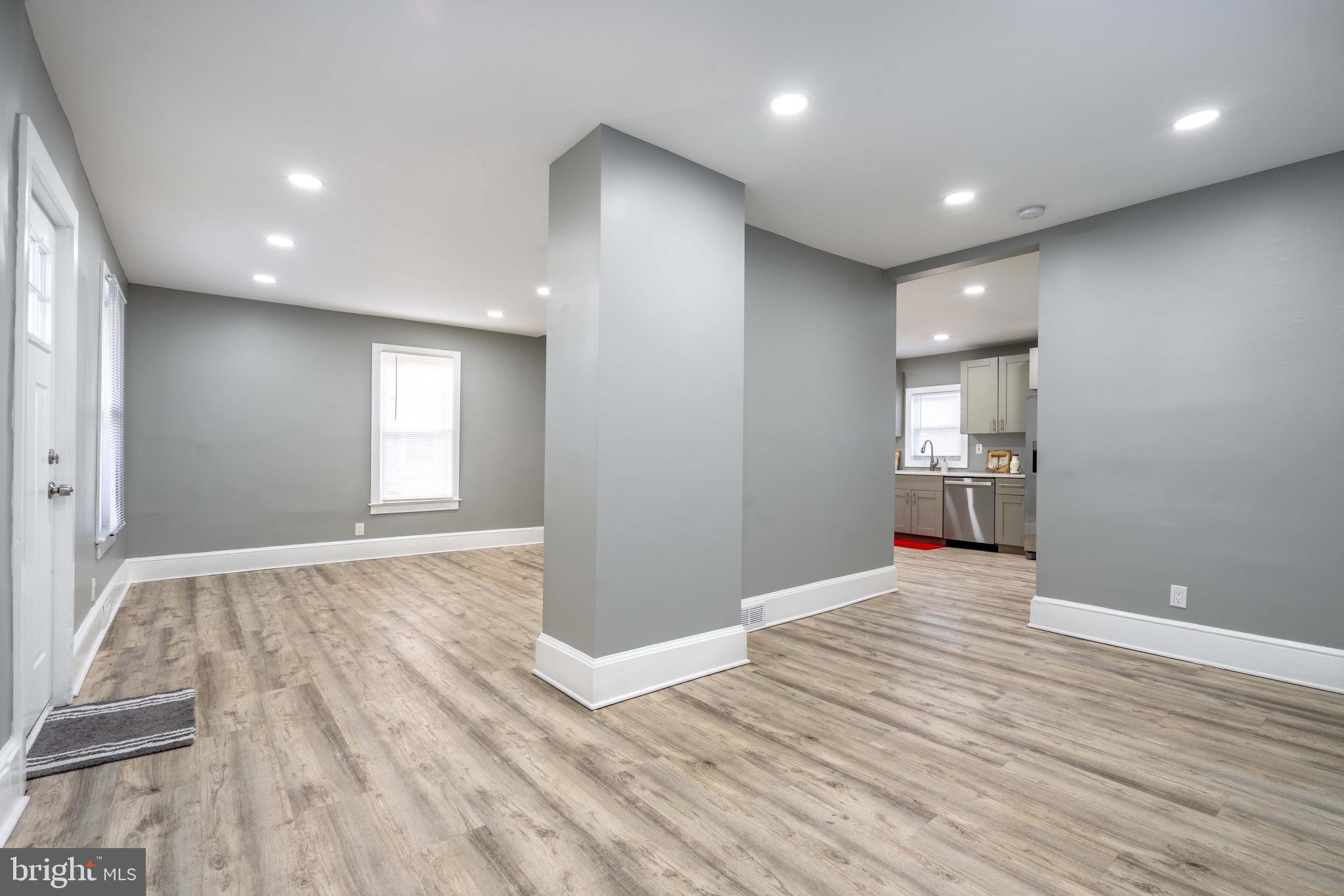 2172 Atco Avenue Atco, NJ 08004 - Photo 16 of 35 an empty room with wooden floor and windows
