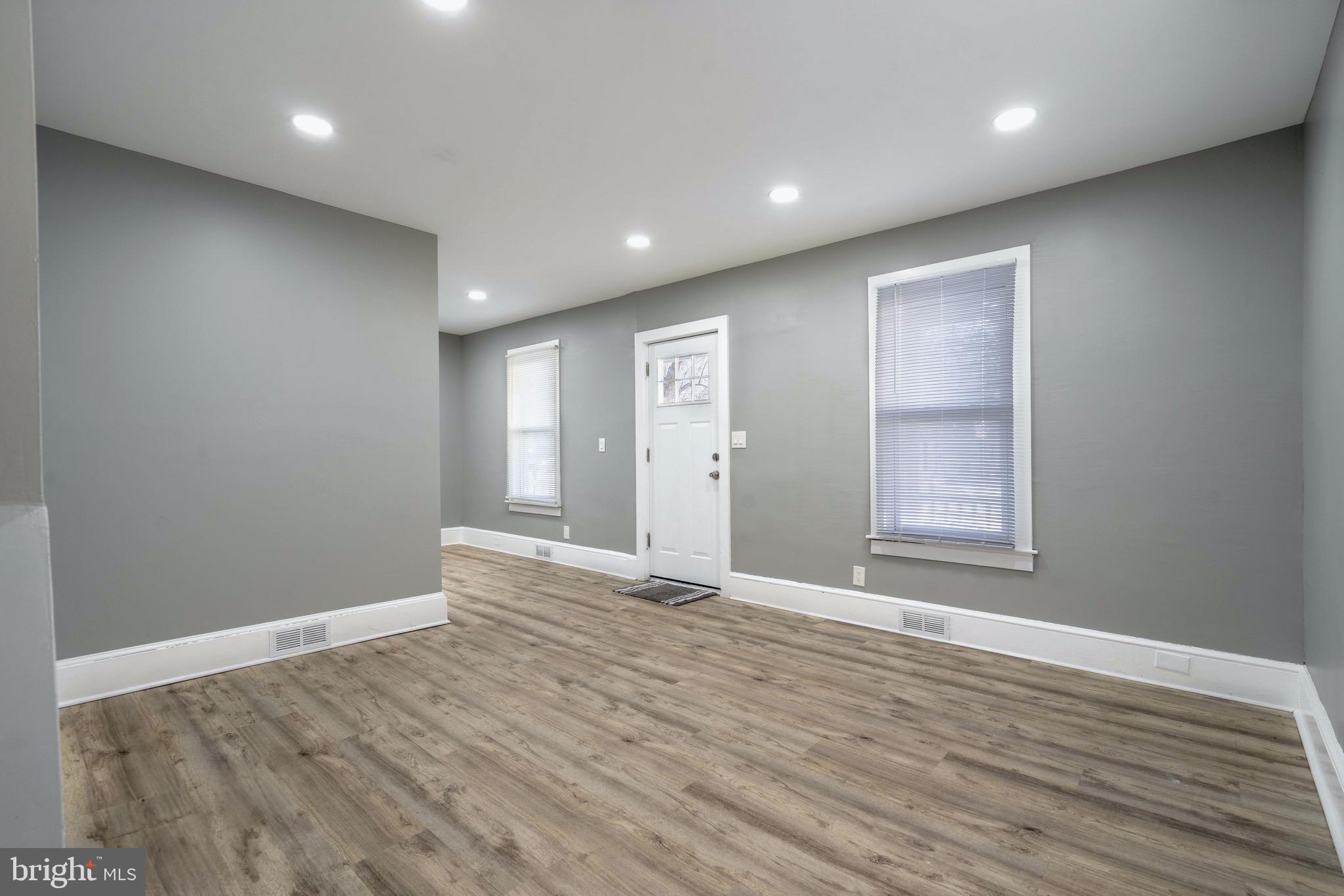 2172 Atco Avenue Atco, NJ 08004 - Photo 17 of 35 an empty room with wooden floor and windows
