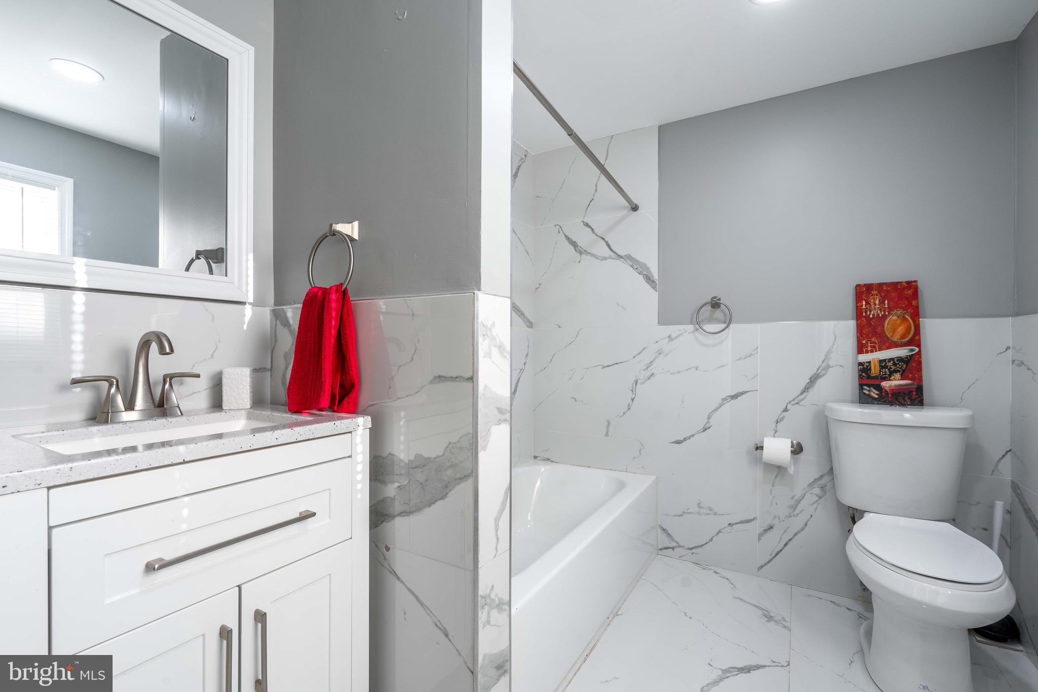 2172 Atco Avenue Atco, NJ 08004 - Photo 18 of 35 a bathroom with a sink toilet and shower