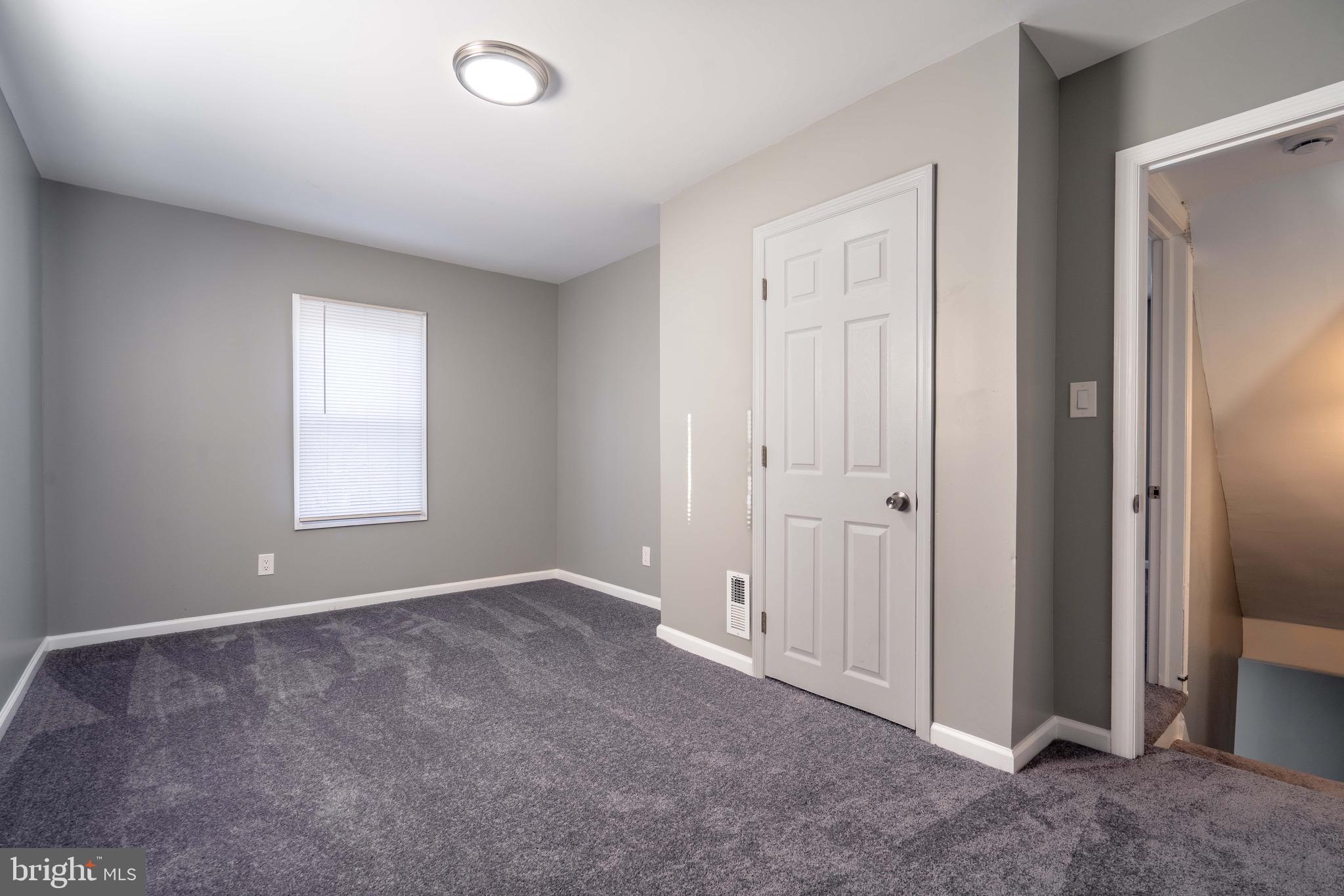 2172 Atco Avenue Atco, NJ 08004 - Photo 23 of 35 a view of an empty room and window
