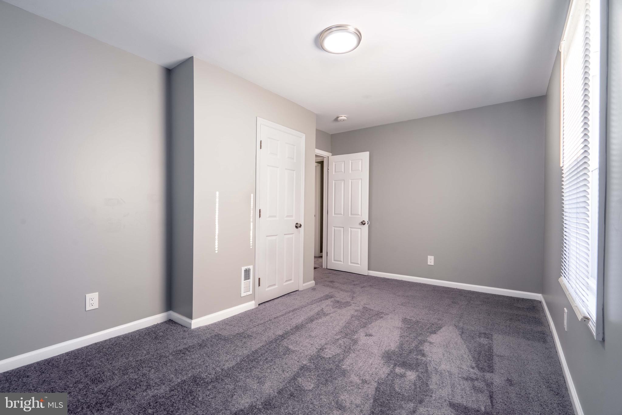 2172 Atco Avenue Atco, NJ 08004 - Photo 24 of 35 an empty room with windows and closet