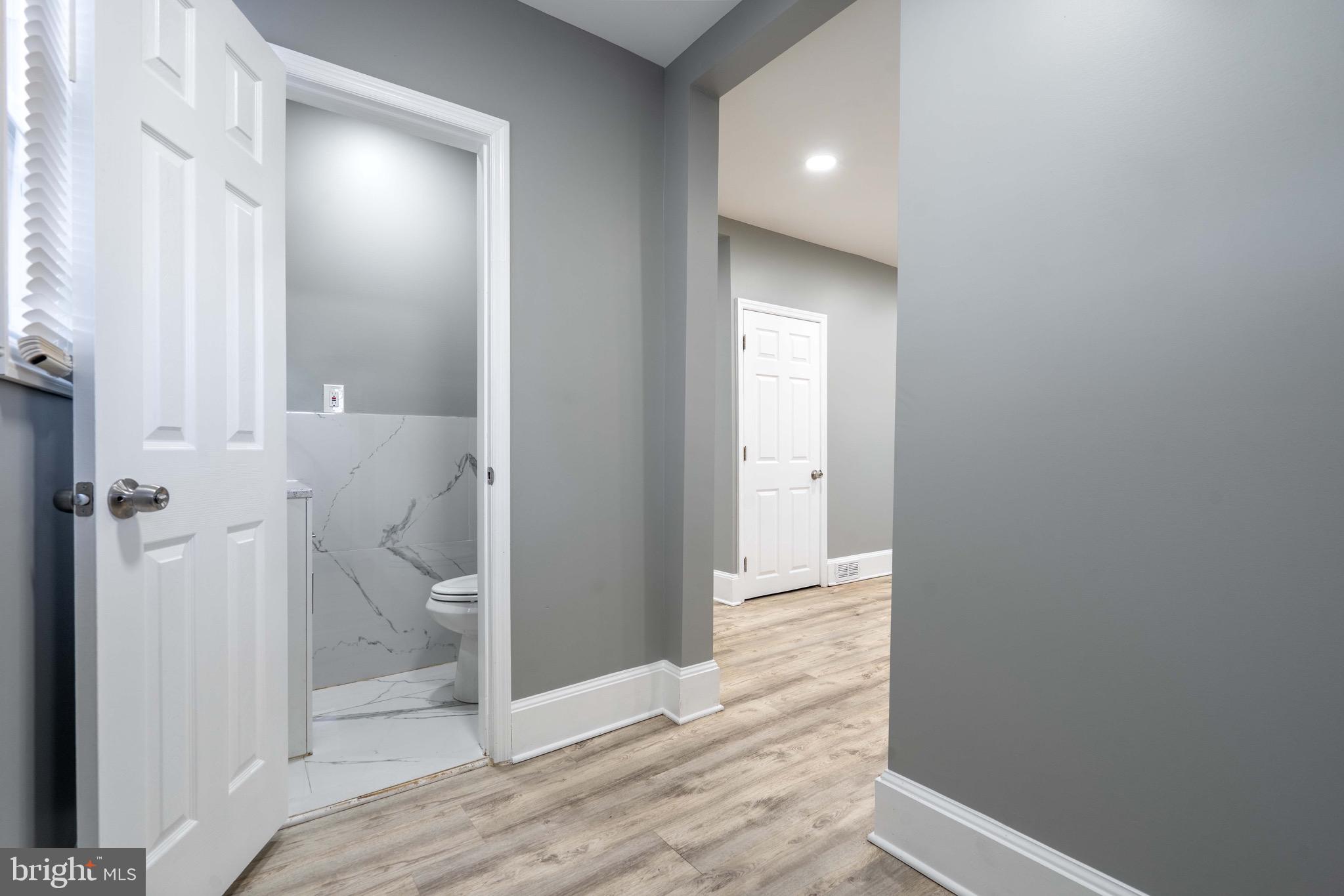 2172 Atco Avenue Atco, NJ 08004 - Photo 26 of 35 a view of a bathroom from a hallway