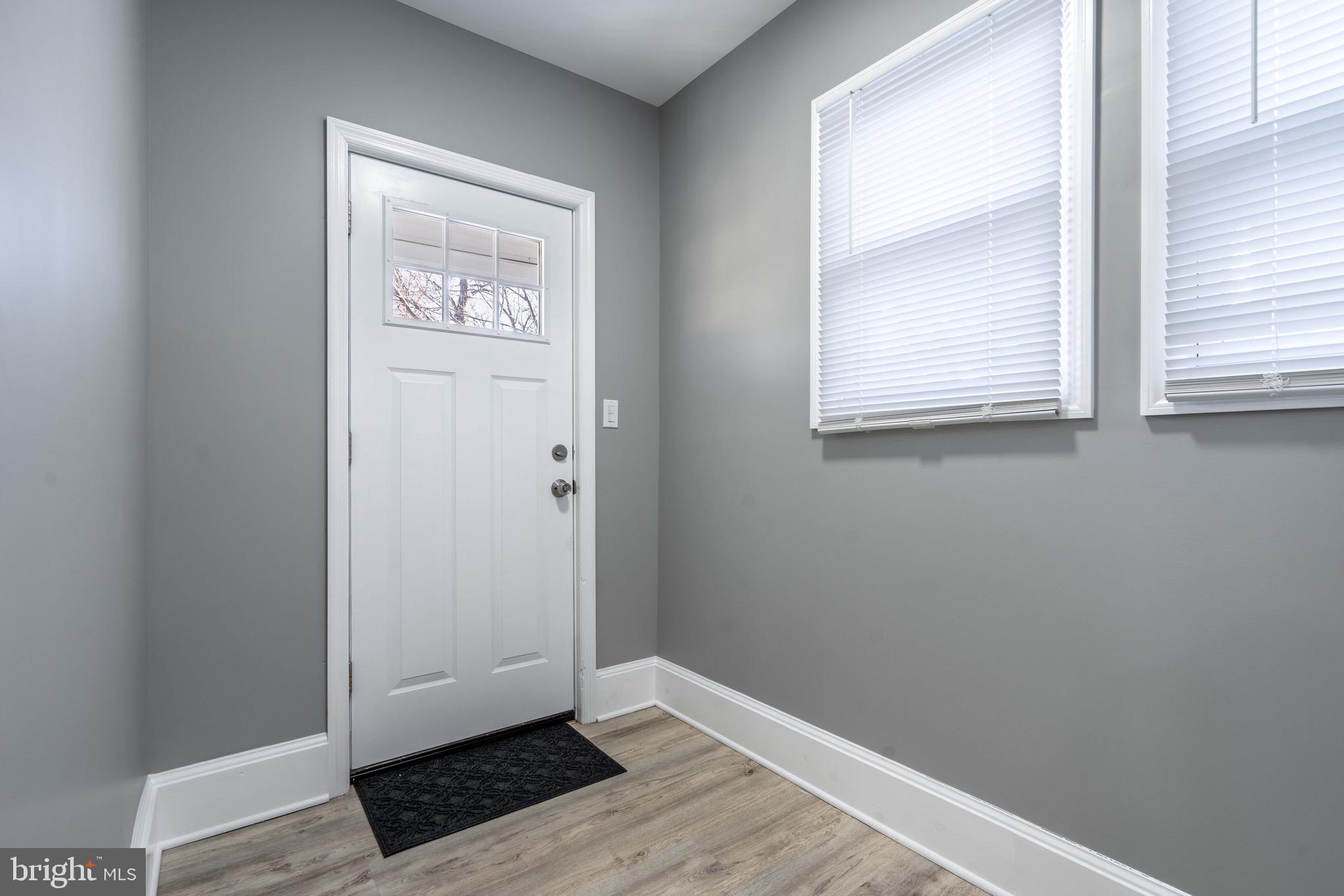 2172 Atco Avenue Atco, NJ 08004 - Photo 28 of 35 a view of an empty room with wooden floor and a window