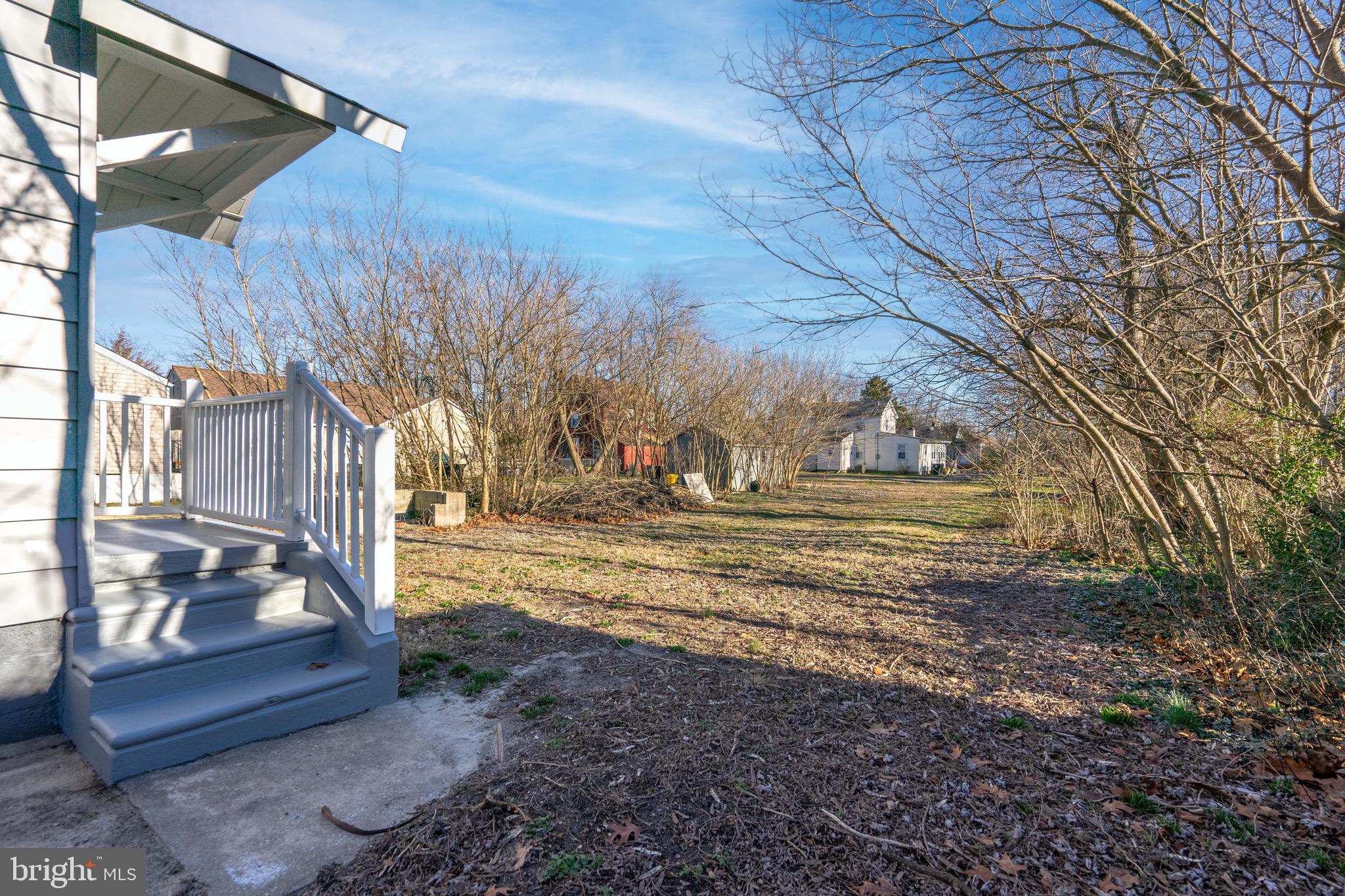 2172 Atco Avenue Atco, NJ 08004 - Photo 34 of 35 a view of a yard with a wooden fence