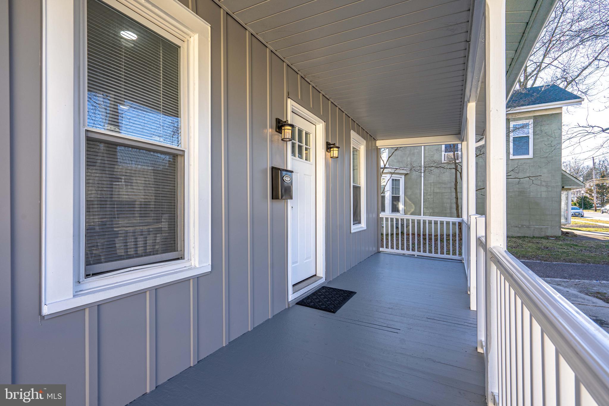 2172 Atco Avenue Atco, NJ 08004 - Photo 4 of 35 a view of a hallway with wooden floor and a window