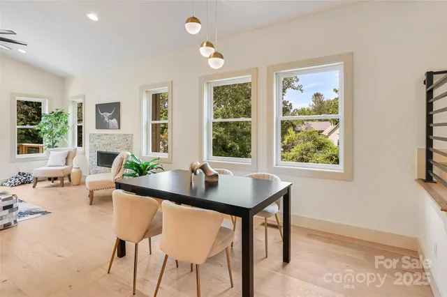 a dining room with furniture and window
