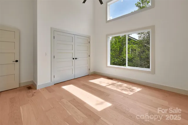 a bathroom with a bath tub a toilet and a shower