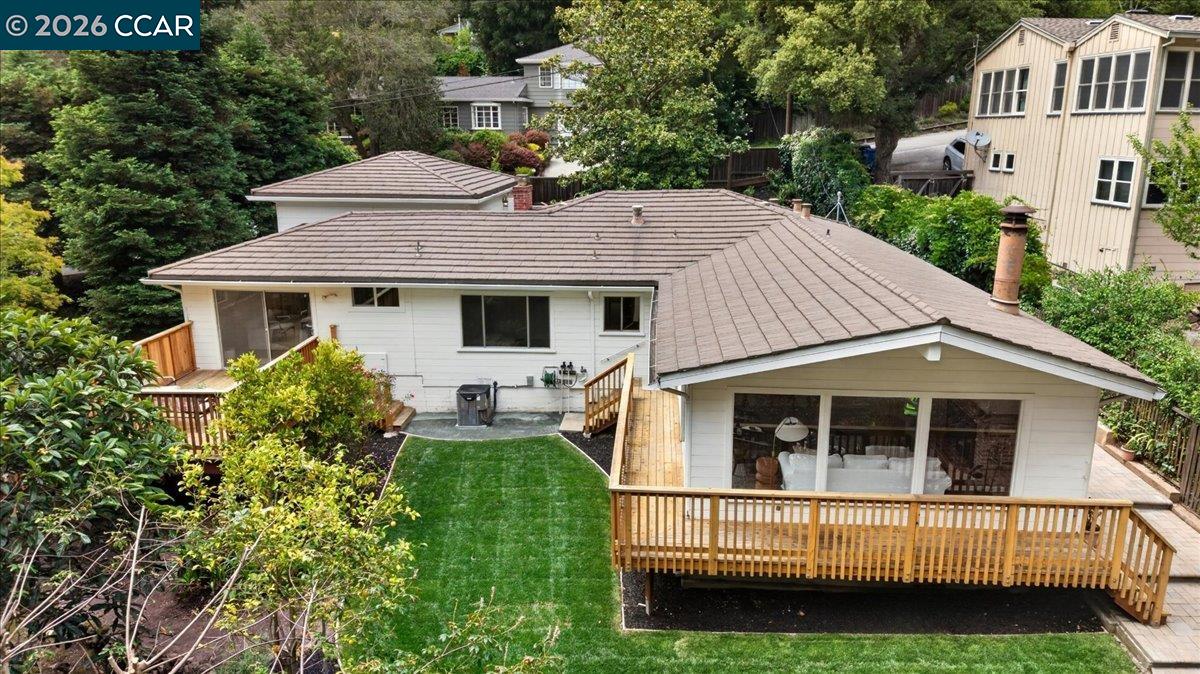 24 Las Vegas Road Orinda, CA 94563 - Photo 46 of 47 a aerial view of a house with a yard table and chairs