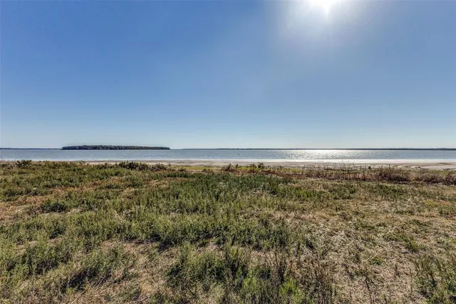 a view of an ocean with city