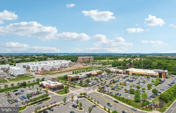 a view of the chairs and tables in the patio