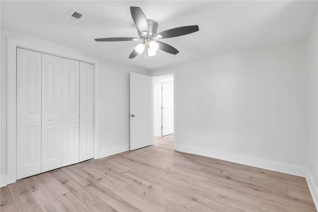 7 Beaverdam Road Williamston, SC 29697 - Photo 21 of 27 A well-lit room with LVP flooring, clean white walls, and a convenient closet.