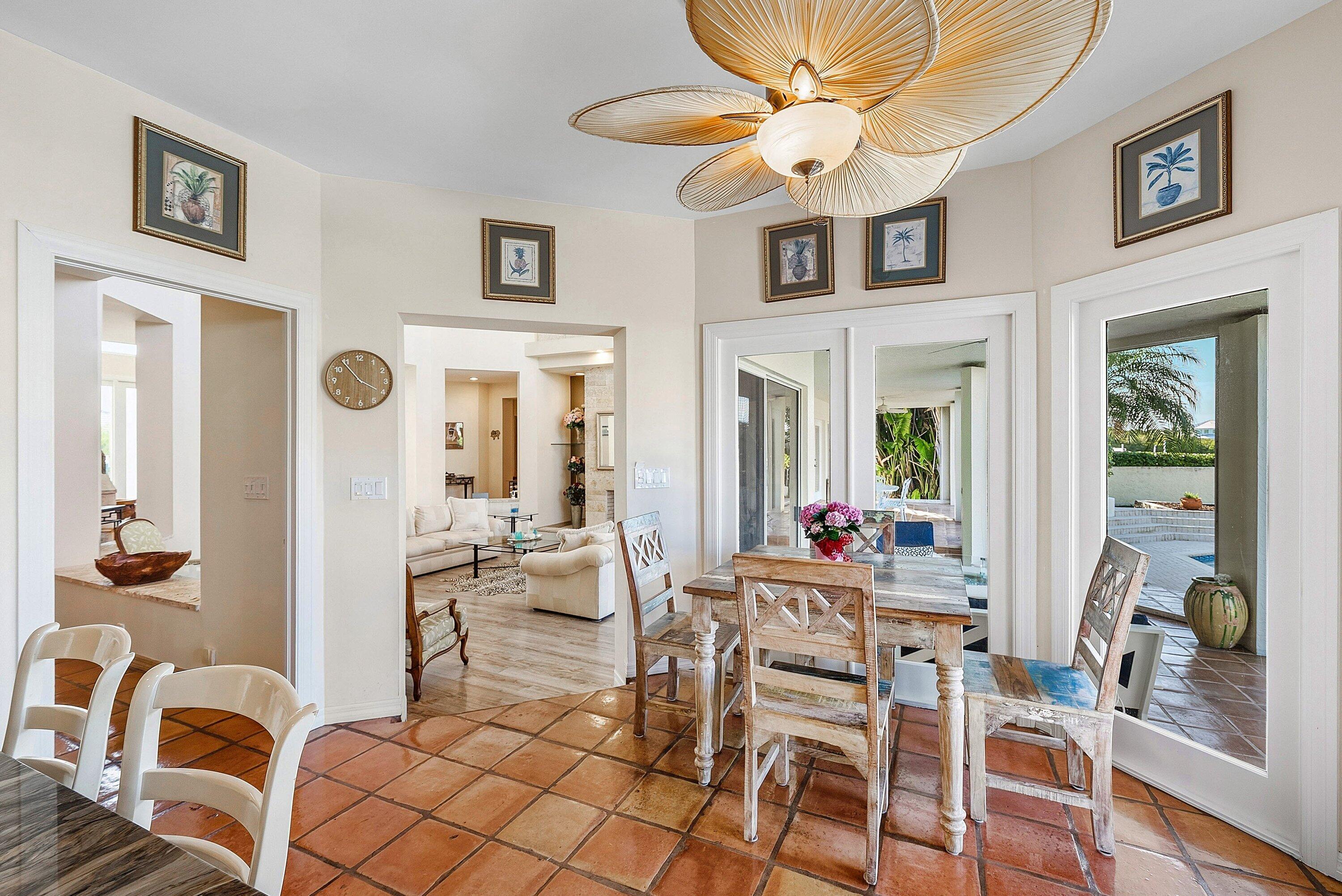 11 Inlet Cay Drive Ocean Ridge, FL 33435 - Photo 15 of 47 a view of a livingroom with furniture and windows