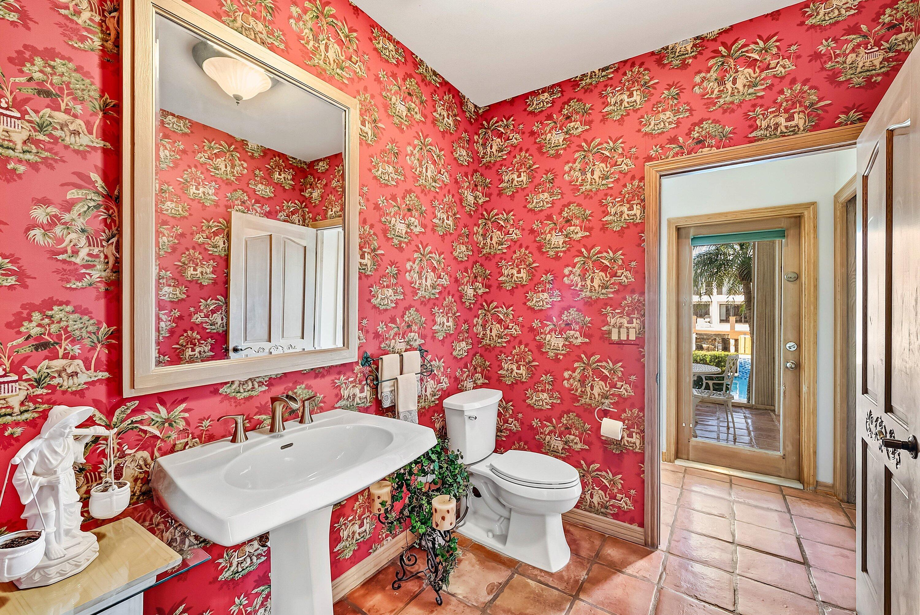 11 Inlet Cay Drive Ocean Ridge, FL 33435 - Photo 22 of 47 a bathroom with a sink toilet and shower