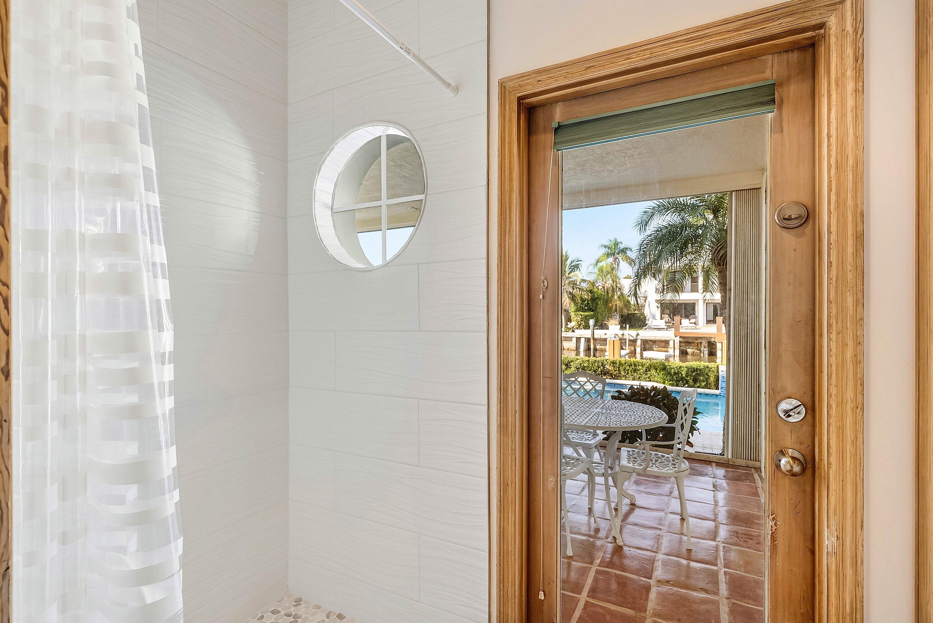 11 Inlet Cay Drive Ocean Ridge, FL 33435 - Photo 23 of 47 a view of a livingroom with furniture and front door