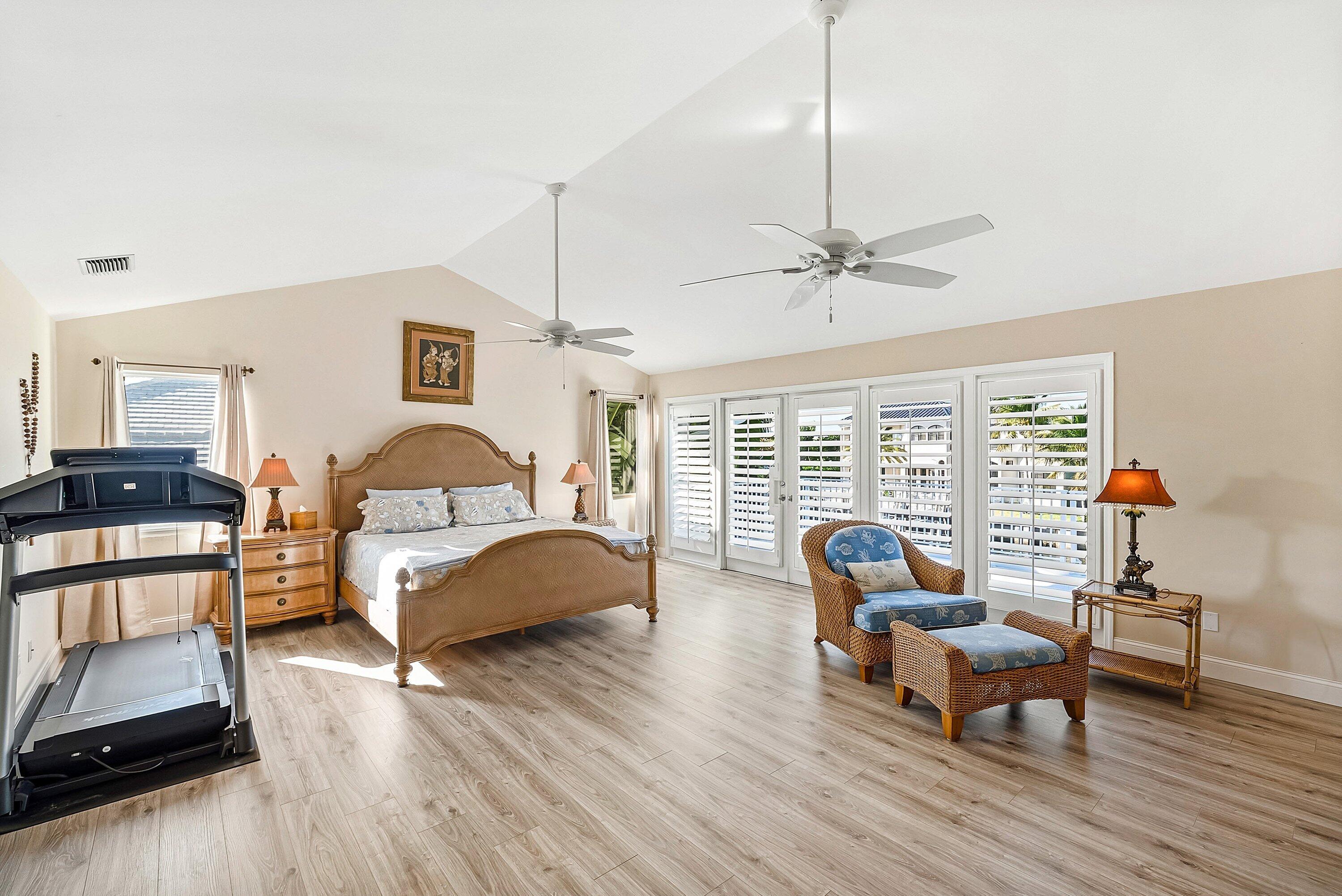 11 Inlet Cay Drive Ocean Ridge, FL 33435 - Photo 25 of 47 a living room with furniture and a wooden floor