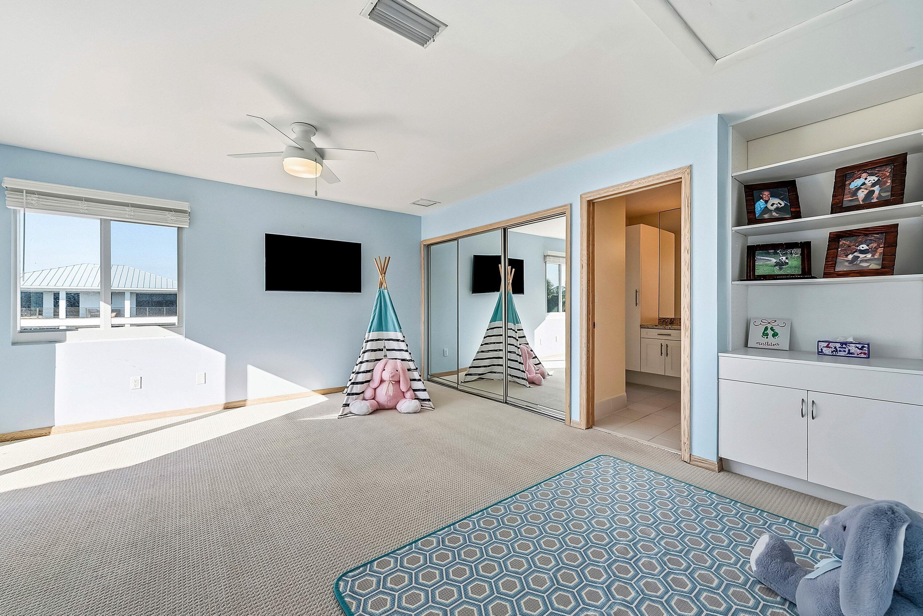 11 Inlet Cay Drive Ocean Ridge, FL 33435 - Photo 32 of 47 a view of a livingroom with cabinet and workspace