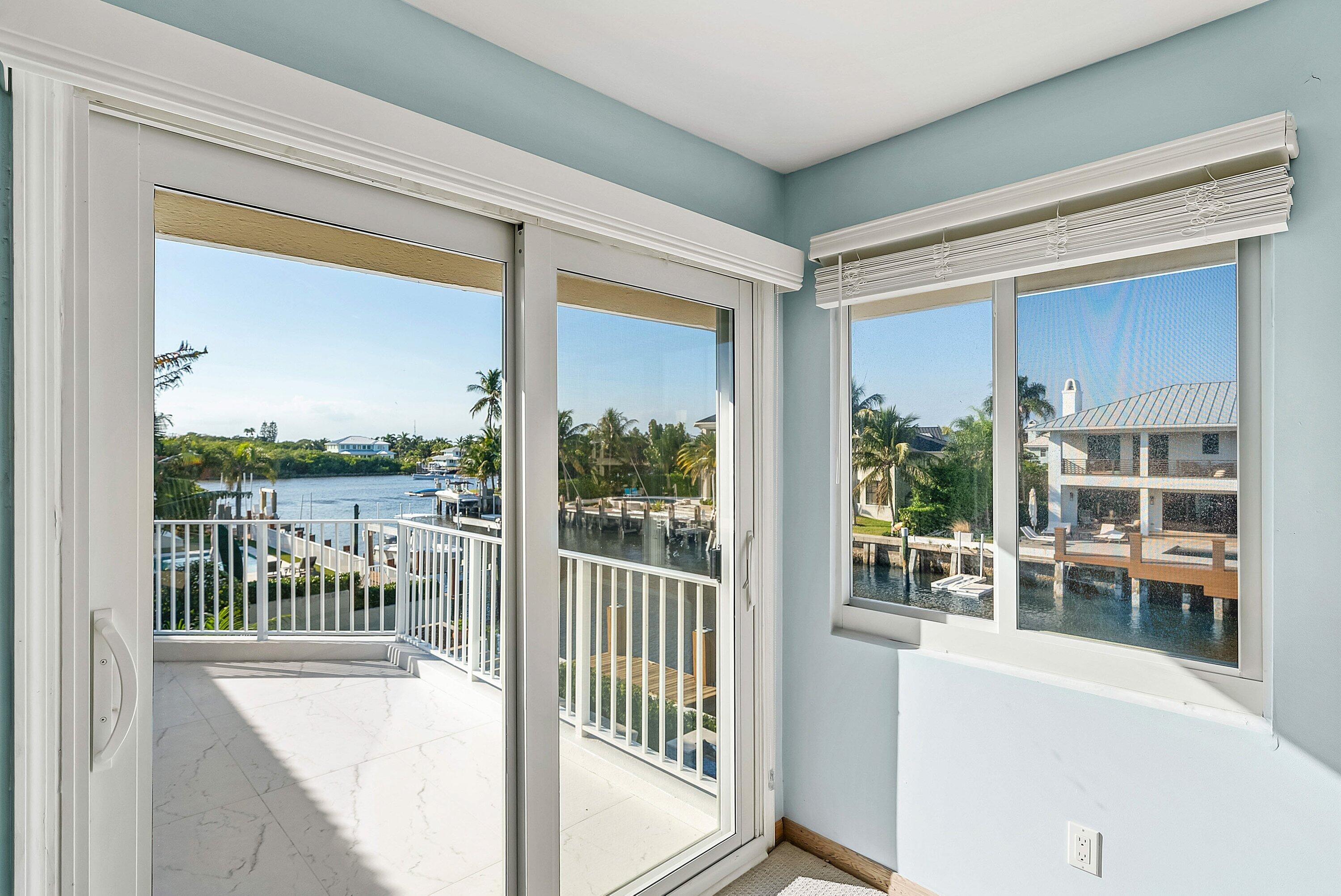 11 Inlet Cay Drive Ocean Ridge, FL 33435 - Photo 34 of 47 a view of a balcony and a floor to ceiling window
