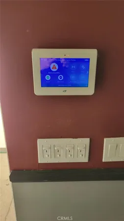 a utility room with red walls