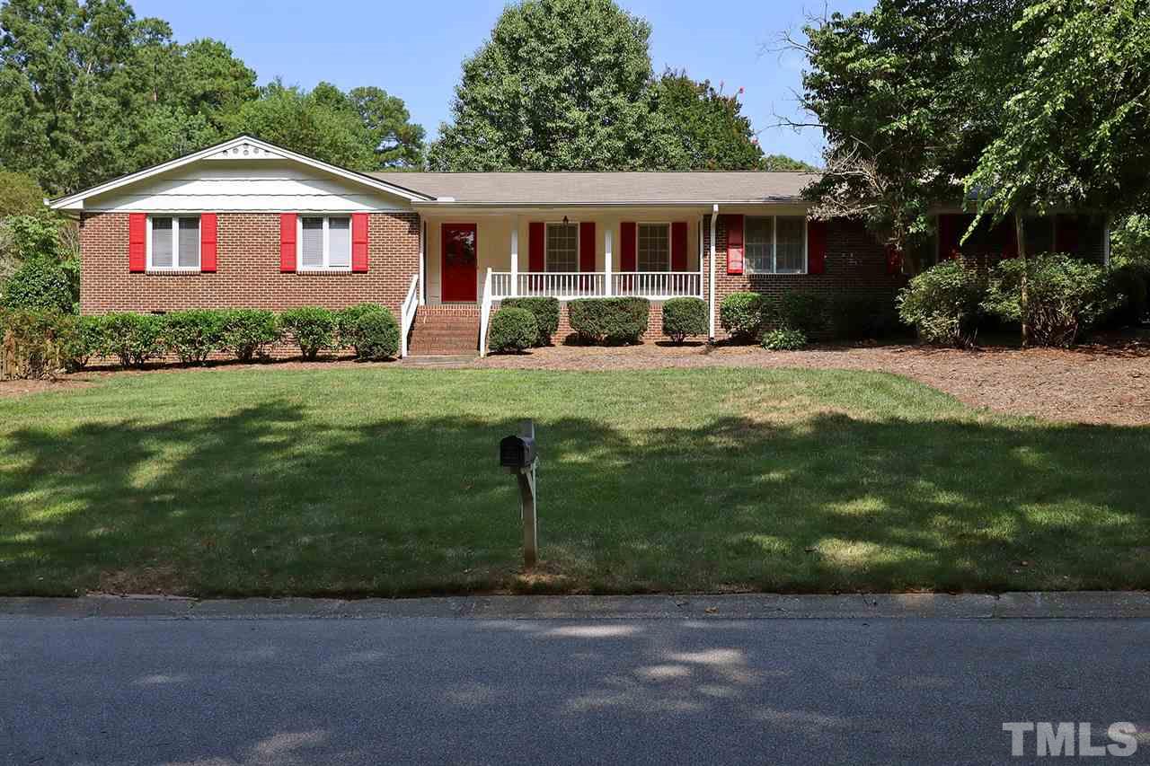5027 Winterlochen Road Raleigh, NC 27603 - Photo 1 of 25 a front view of house with yard and green space