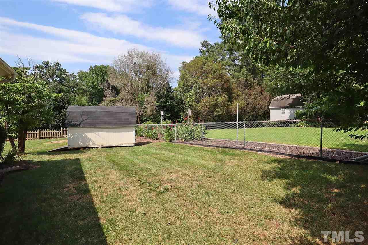 5027 Winterlochen Road Raleigh, NC 27603 - Photo 20 of 25 a view of a park with large trees