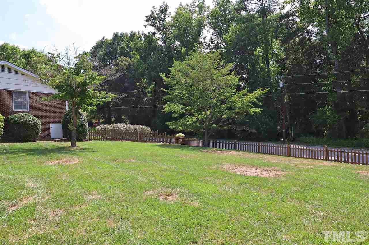 5027 Winterlochen Road Raleigh, NC 27603 - Photo 21 of 25 a swimming pool with outdoor seating and yard