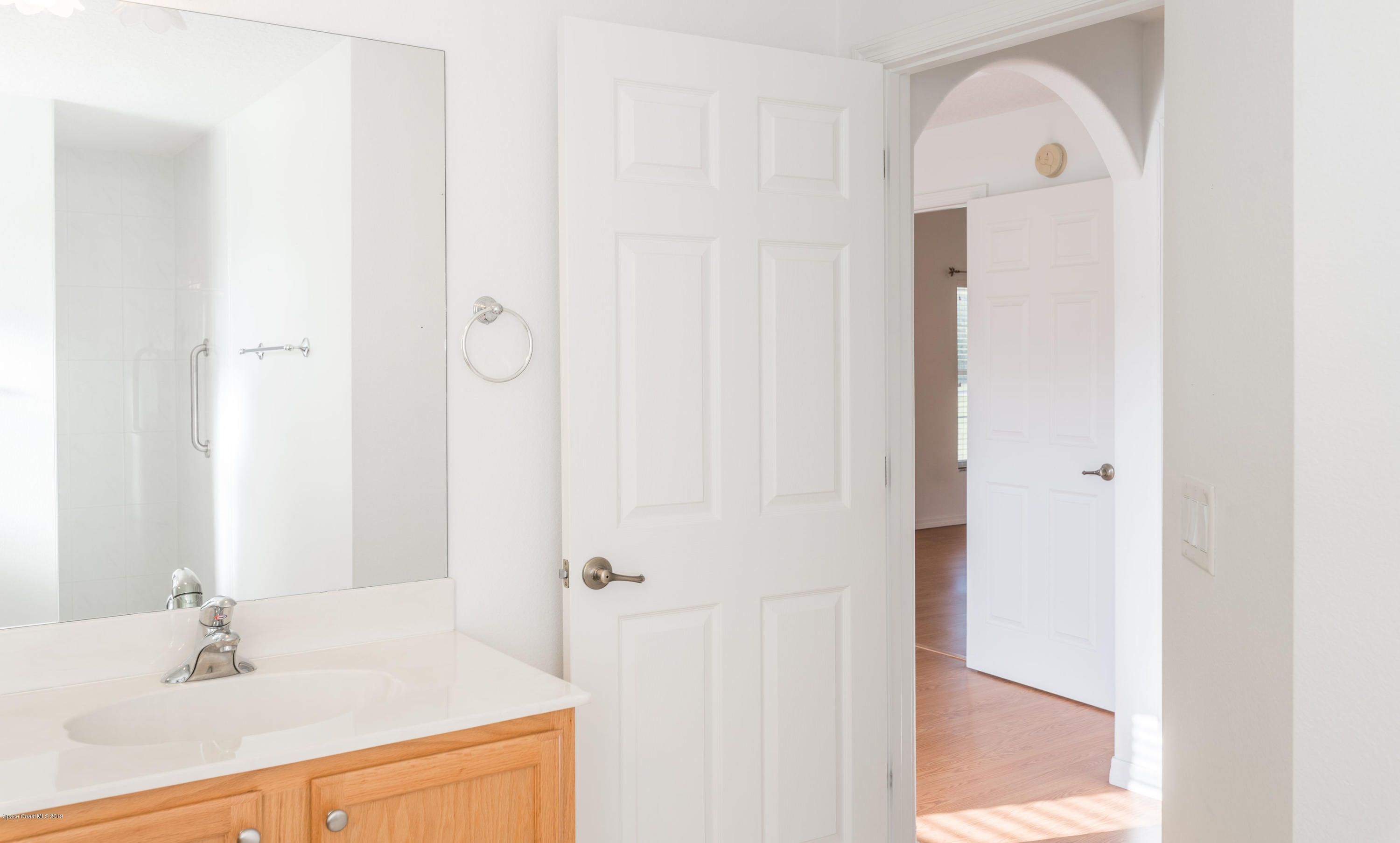 3700 Grant Line Road Mims, FL 32754 - Photo 23 of 40 a bathroom with a sink and a mirror