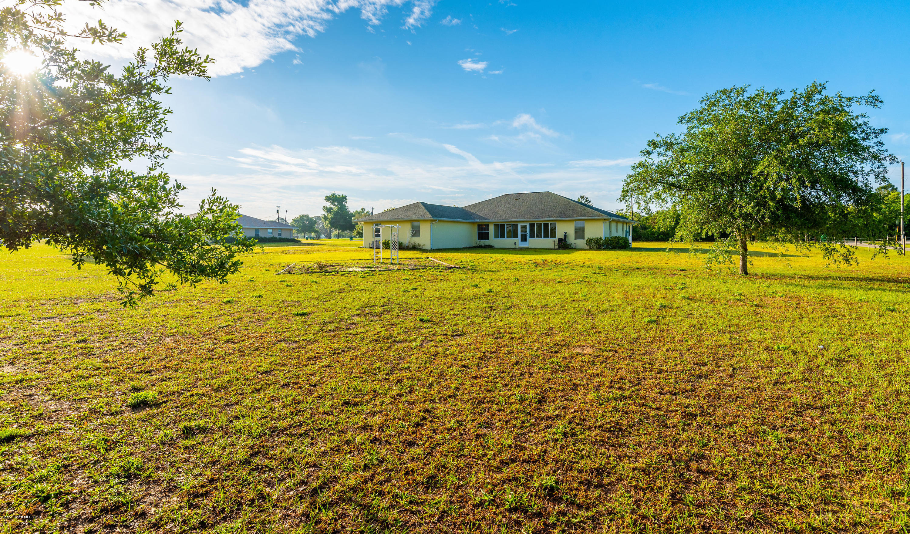 3700 Grant Line Road Mims, FL 32754 - Photo 34 of 40 a view of an ocean from a yard