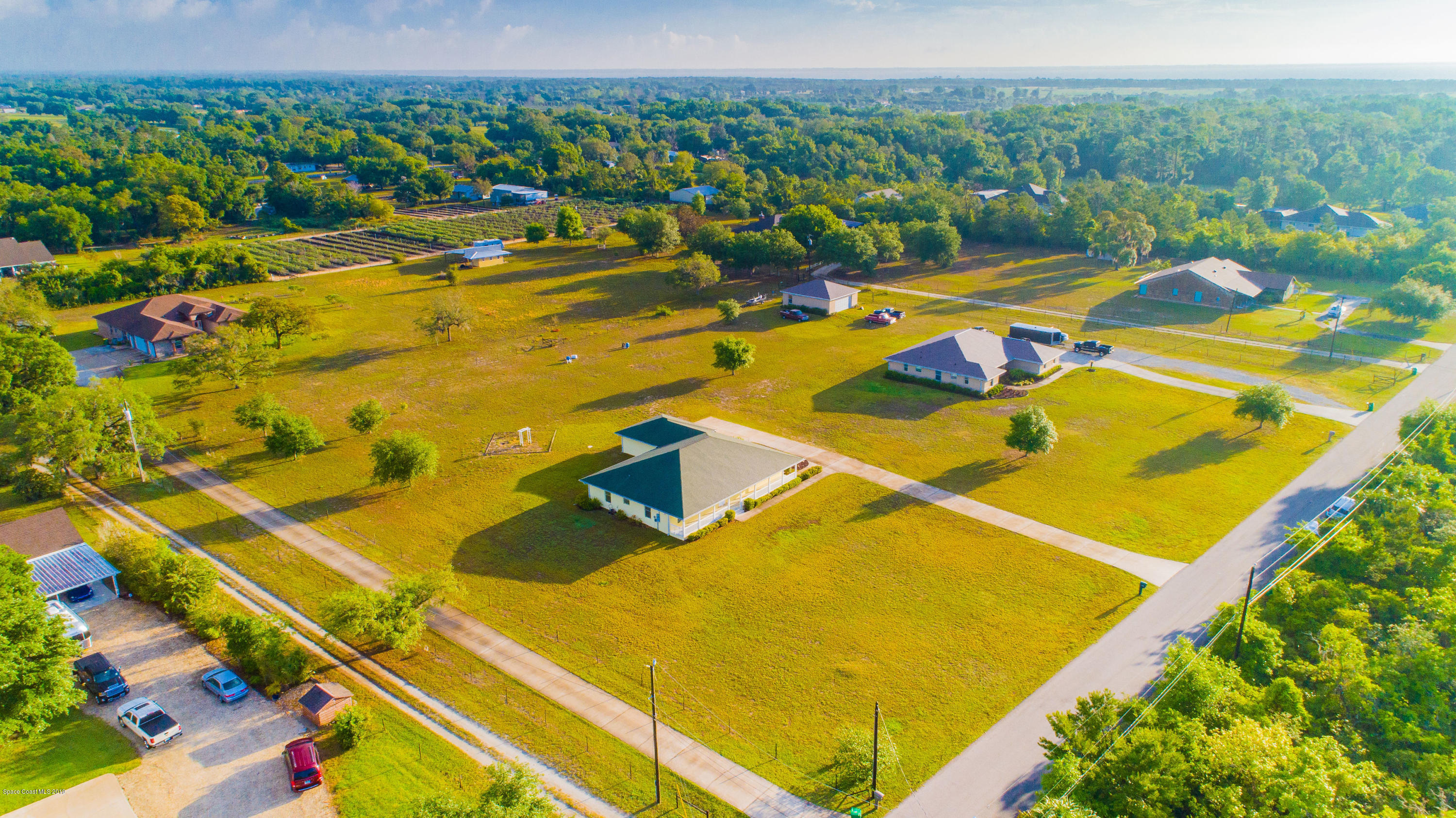 3700 Grant Line Road Mims, FL 32754 - Photo 36 of 40 a view of a tennis court