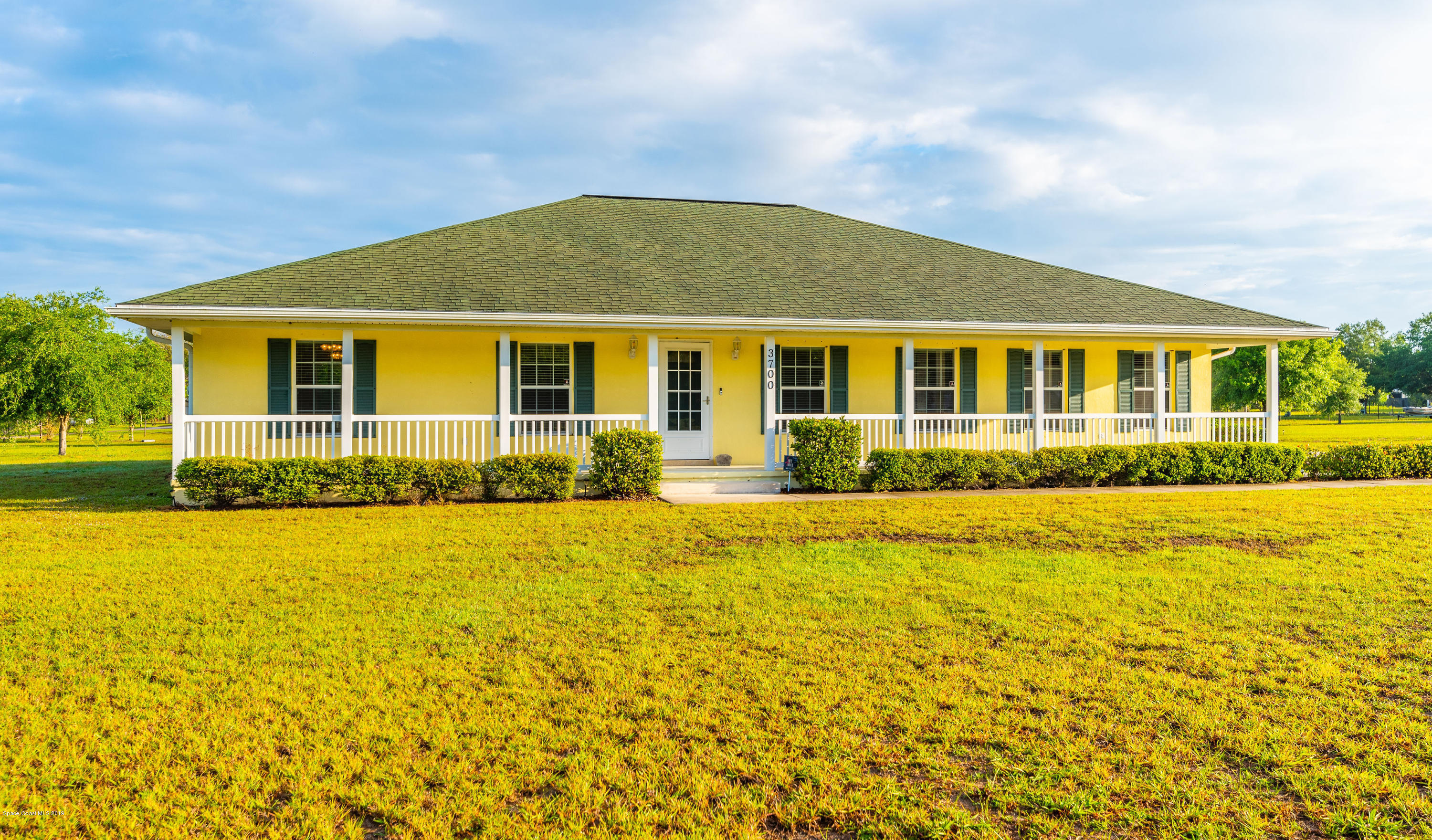 3700 Grant Line Road Mims, FL 32754 - Photo 6 of 40 front view of a house with a yard