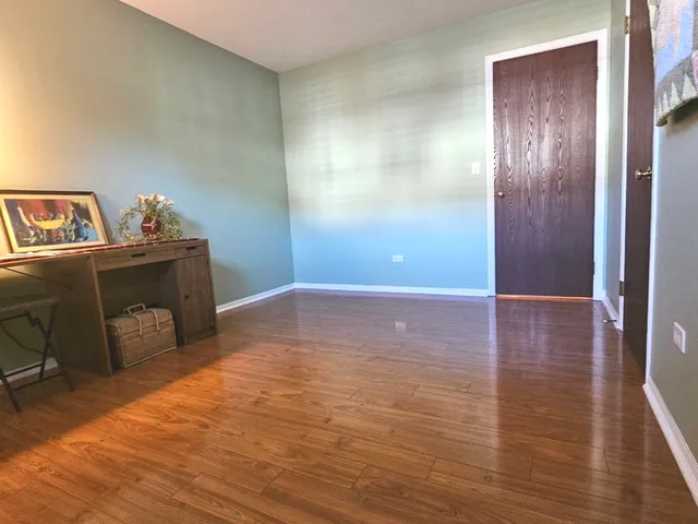 a bathroom with a sink a toilet and shower curtain
