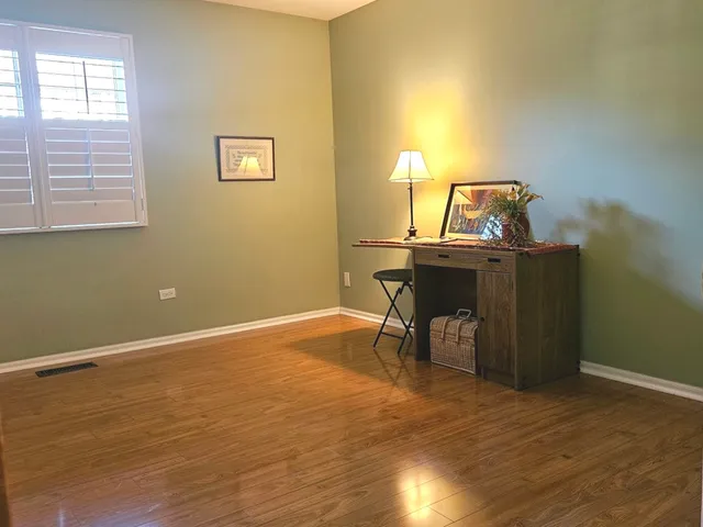 a view of a livingroom with wooden floor