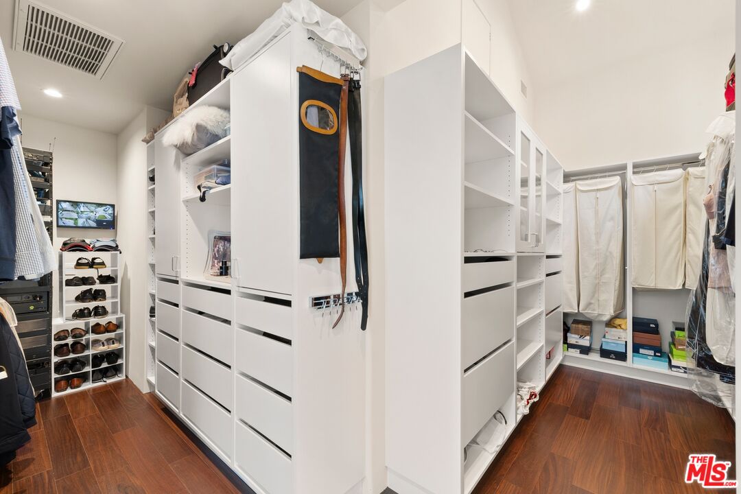 2654 Roscomare Road Los Angeles, CA 90077 - Photo 20 of 29 a view of walk in closet with white walls