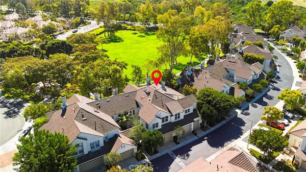 an aerial view of house with yard