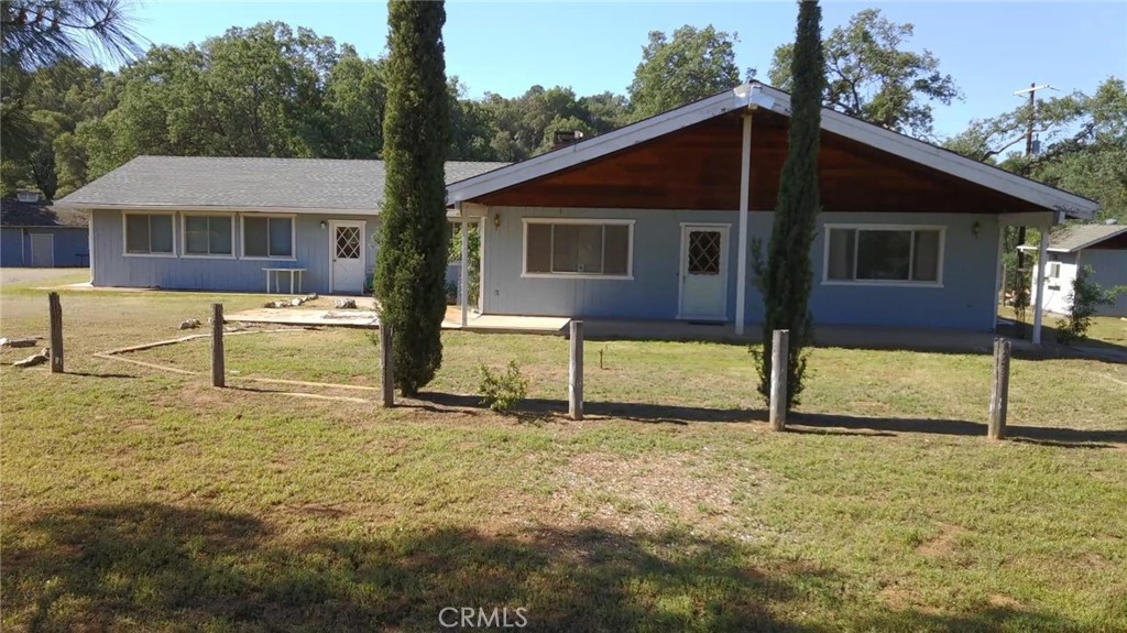 4952 Hidden Springs Road Mariposa, CA 95338 - Photo 1 of 53 a front view of a house with a yard