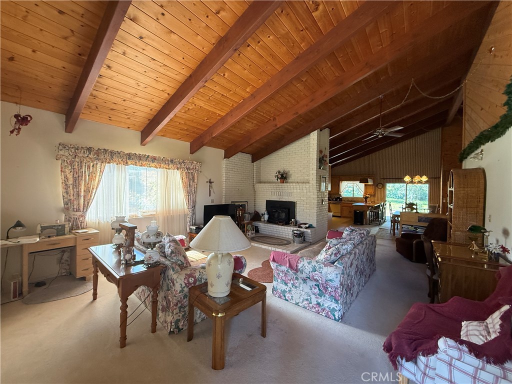 4952 Hidden Springs Road Mariposa, CA 95338 - Photo 13 of 53 a view of a livingroom with furniture and a large window