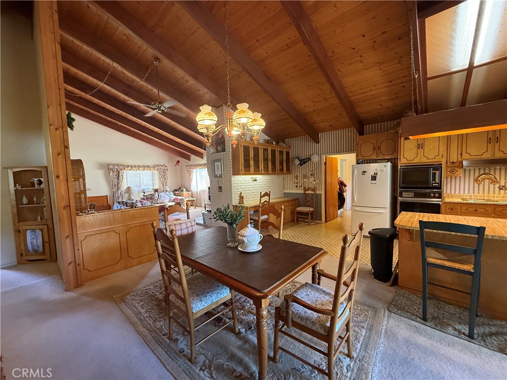4952 Hidden Springs Road Mariposa, CA 95338 - Photo 25 of 53 a view of a dining room with furniture