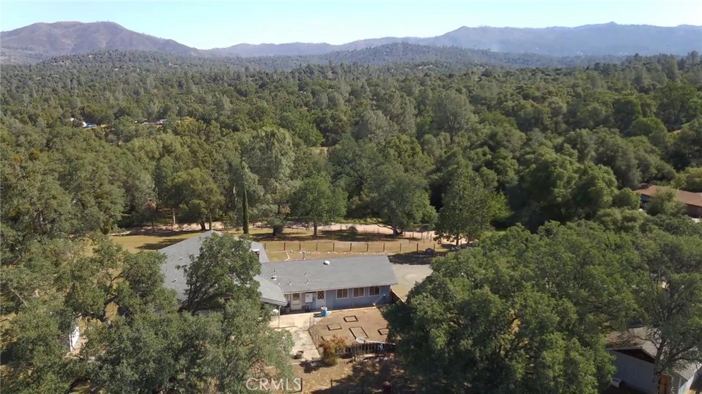 4952 Hidden Springs Road Mariposa, CA 95338 - Photo 3 of 53 a view of a house with a mountain