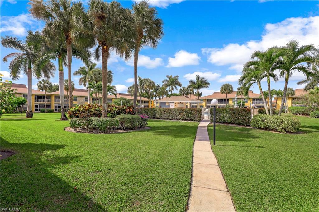 21 Lemans Drive Naples, FL 34112 - Photo 26 of 26 a view of a park with palm trees