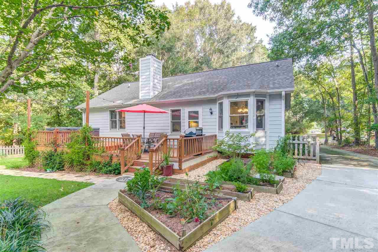 2724 Quail Point Drive Raleigh, NC 27603 - Photo 25 of 25 a front view of a house with garden