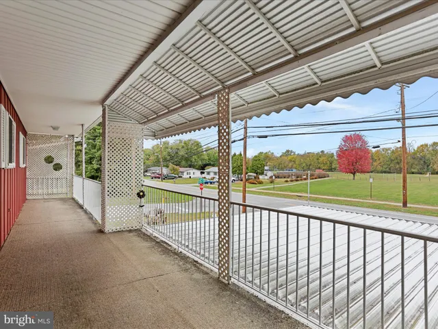 a view of a porch and garden