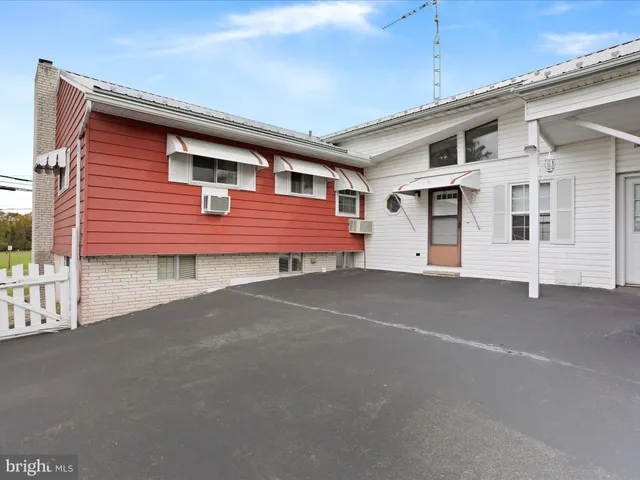 a front view of a house with a garage