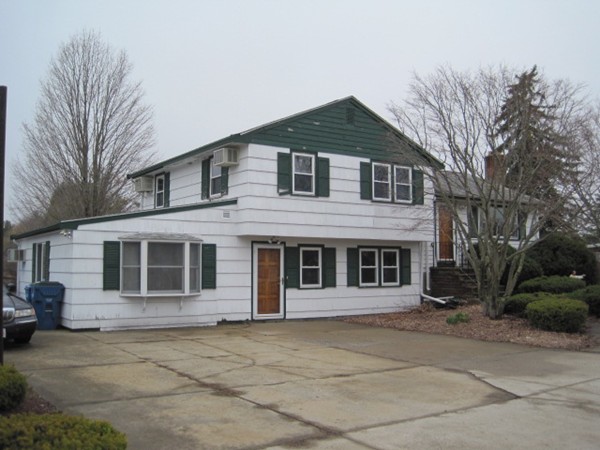 15 Tilden Road Canton, MA 02021 - Photo 1 of 23 a front view of a house with a garden