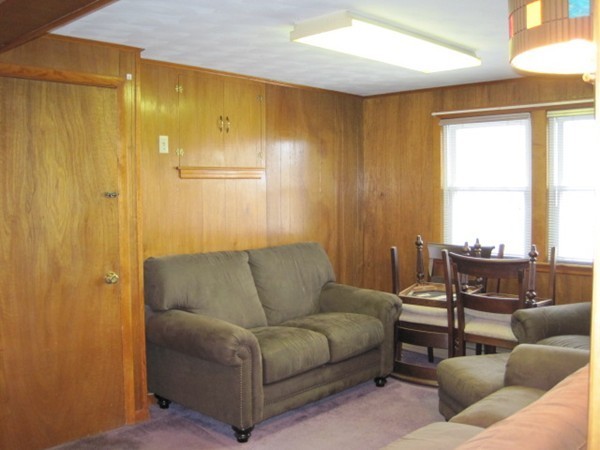 15 Tilden Road Canton, MA 02021 - Photo 15 of 23 a living room with furniture and a large window