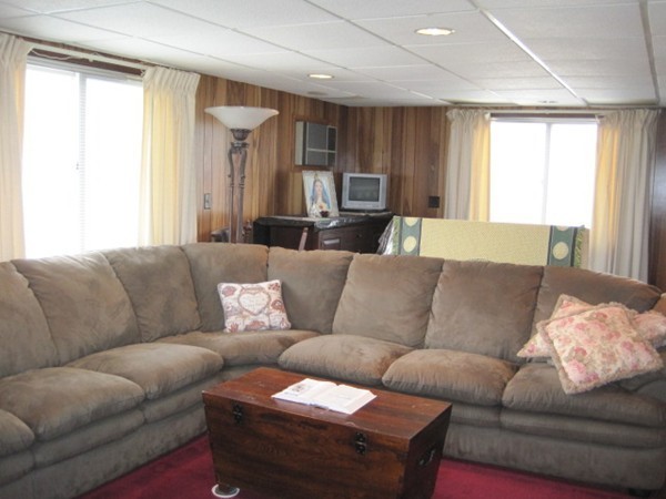 15 Tilden Road Canton, MA 02021 - Photo 16 of 23 a living room with furniture and a large window