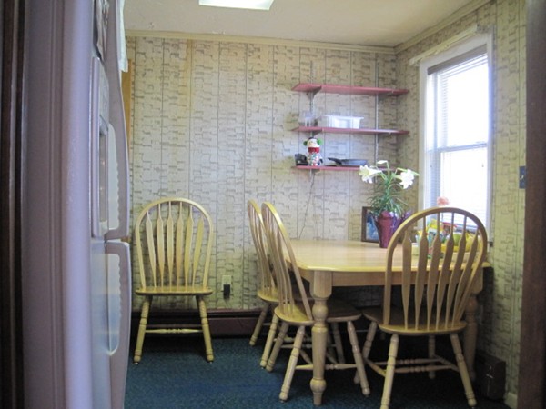 15 Tilden Road Canton, MA 02021 - Photo 18 of 23 a view of a dining room with furniture and a window