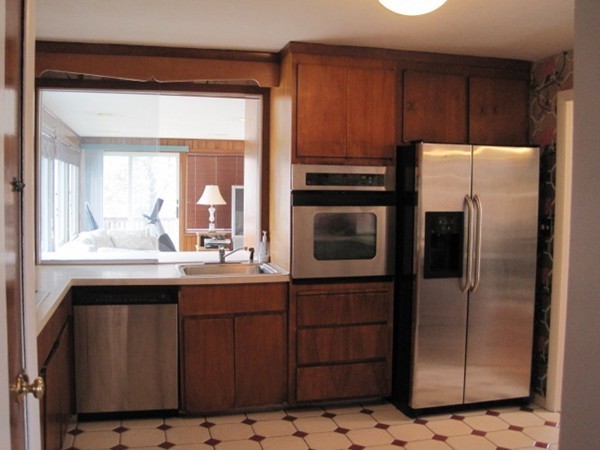 15 Tilden Road Canton, MA 02021 - Photo 3 of 23 a kitchen with stainless steel appliances granite countertop a refrigerator and a sink
