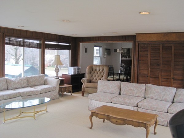 15 Tilden Road Canton, MA 02021 - Photo 6 of 23 a living room with furniture and a large window