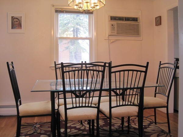 15 Tilden Road Canton, MA 02021 - Photo 8 of 23 a view of a dining room with furniture window and outside view