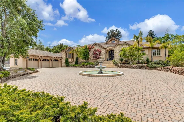 a vase of flowers sitting on a table